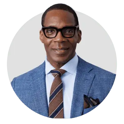 Professional man in a suit, representing LA Solar Group's expertise in solar energy solutions.